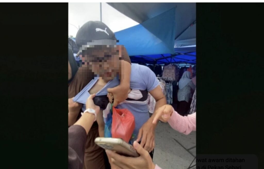 Penjawat Awam Di Tahan Ambil Gambar